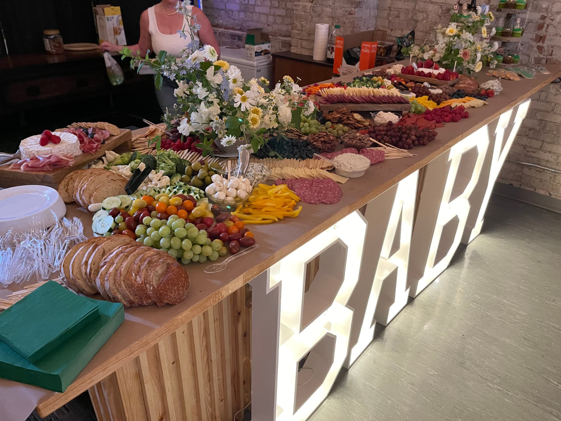Grazing table of fruit and appetizers for a baby shower at Host Wenatchee